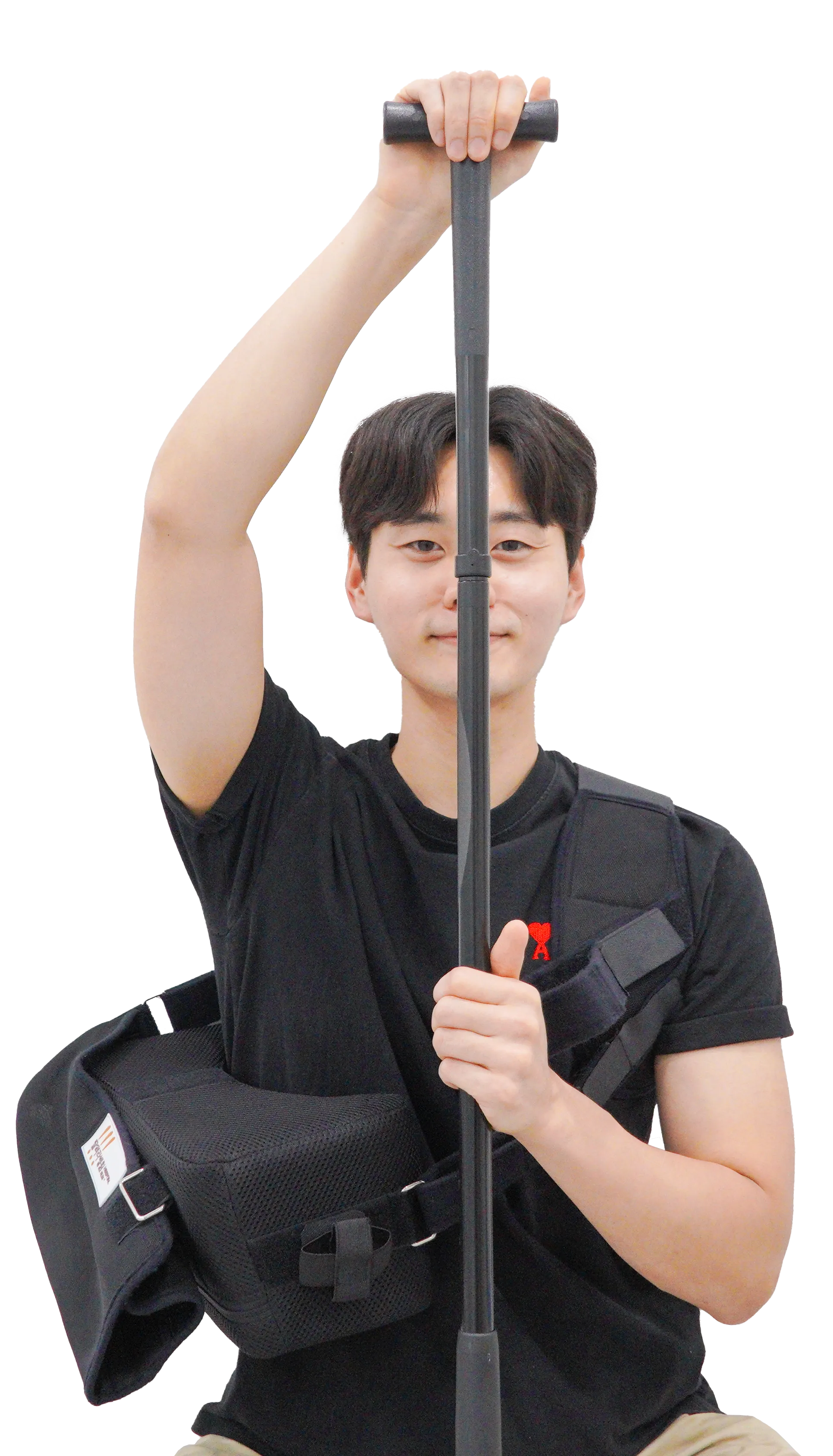 T바(막대)를 이용한 어깨 운동. 양손으로 막대를 잡고 건강한 팔의 힘으로 아픈 쪽 팔을 밀어 올린다